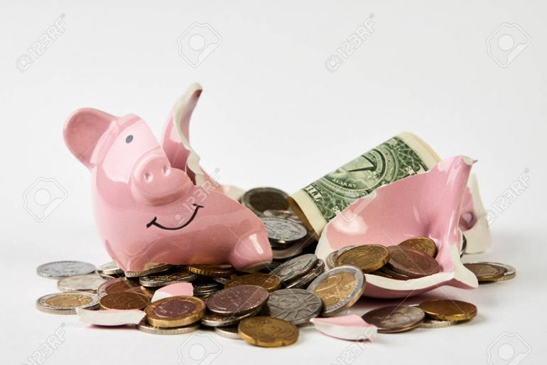 118742148-broken-piggy-bank-with-coins-money-isolated-on-white-background-close-up-finance-saving-money-for-tr.jpg
